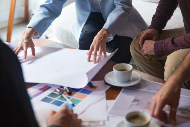 interior designer presenting blueprint 74855 2951