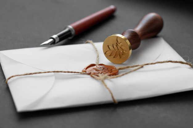 notary public wax stamper white envelope with brown wax seal golden stamp still life with postal accessories 177415 19